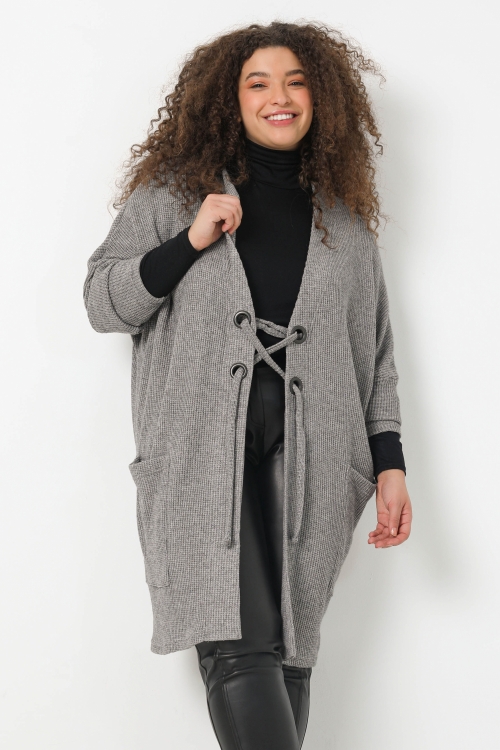 Long knitted cardigan with eyelets