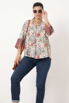 Printed blouse with braid on the sleeves