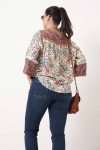 Printed blouse with braid on the sleeves