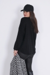 Pull en maille unie relief pied de coq 