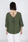 plain blouse buttoned on the back