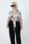 Short bolero in printed design based on