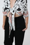 Short bolero in printed design based on