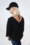 plain blouse buttoned on the back