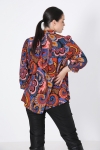 Trapezoid-shaped printed shirt with braid.