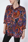 Trapezoid-shaped printed shirt with braid.