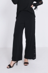 Black trousers with side eyelets - fluid and stretchy knit