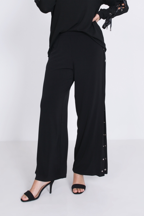 Black trousers with side eyelets - fluid and stretchy knit