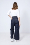 Raw flared low jeans