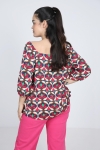 Printed blouse with cascading ruffles