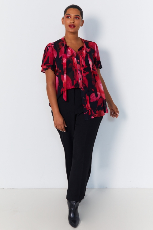 Shirt with flat pleats and floral print