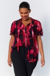 Shirt with flat pleats and floral print