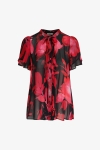 Shirt with flat pleats and floral print