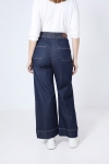 Raw flared low jeans