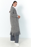 Chevron print coat with fringes.