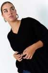 Oversized plain knit sweater with honeycomb effect