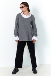 Chic sweater with poplin shirt effect underneath.