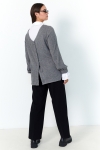 Chic sweater with poplin shirt effect underneath.