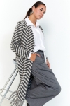 Chevron print coat with fringes.