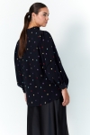 Astro print blouse with plain braid inlay