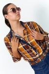 Plaid shirt with macramé braid