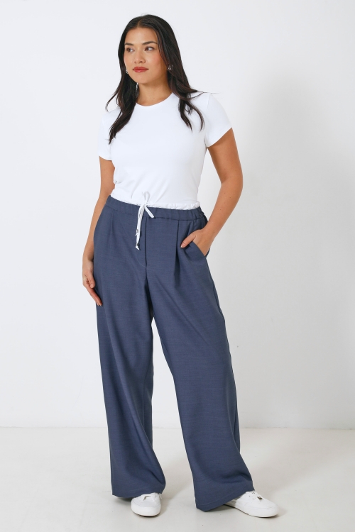 Wide double-waisted pants in two materials 