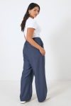 Wide double-waisted pants in two materials 