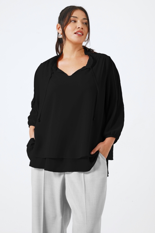 Plain voile blouse layered with a Mao collar