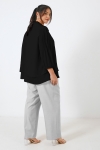 Plain voile blouse layered with a Mao collar