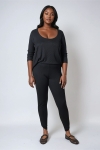 Plain knit leggings with row of buttons