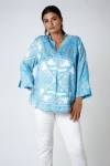 Printed blouse with a satin effect base.