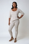 Plain knit leggings with row of buttons