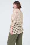 Plain knitted sweater with wide chainmail effect