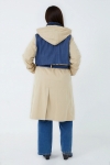 Water-repellent two-material trench coat with hood