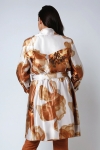 Satin effect trench coat with large flower motif.