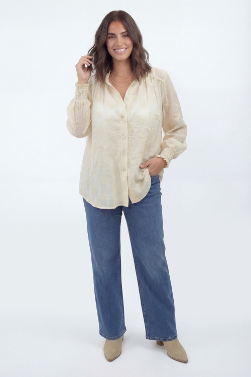 Embroidered blouse with a high neck