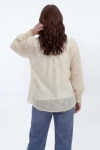Embroidered blouse with a high neck