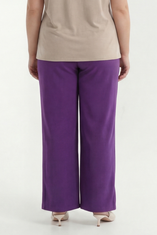 Purple flowy trousers with elasticated waist