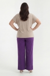 Purple flowy trousers with elasticated waist